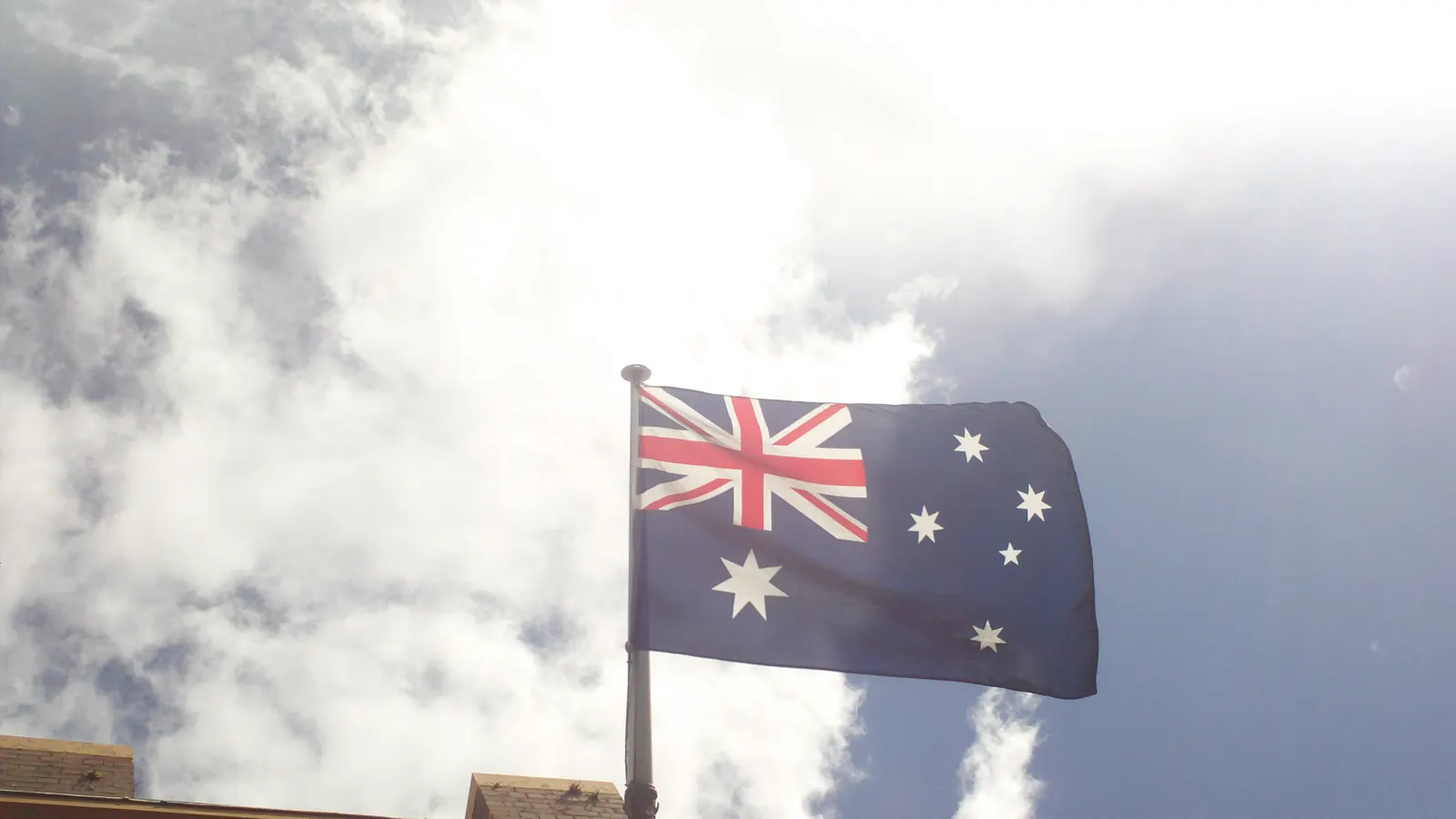 The Australian National Flag with the Southern Cross and the Commonwealth Star flying in The Rocks, Sydney