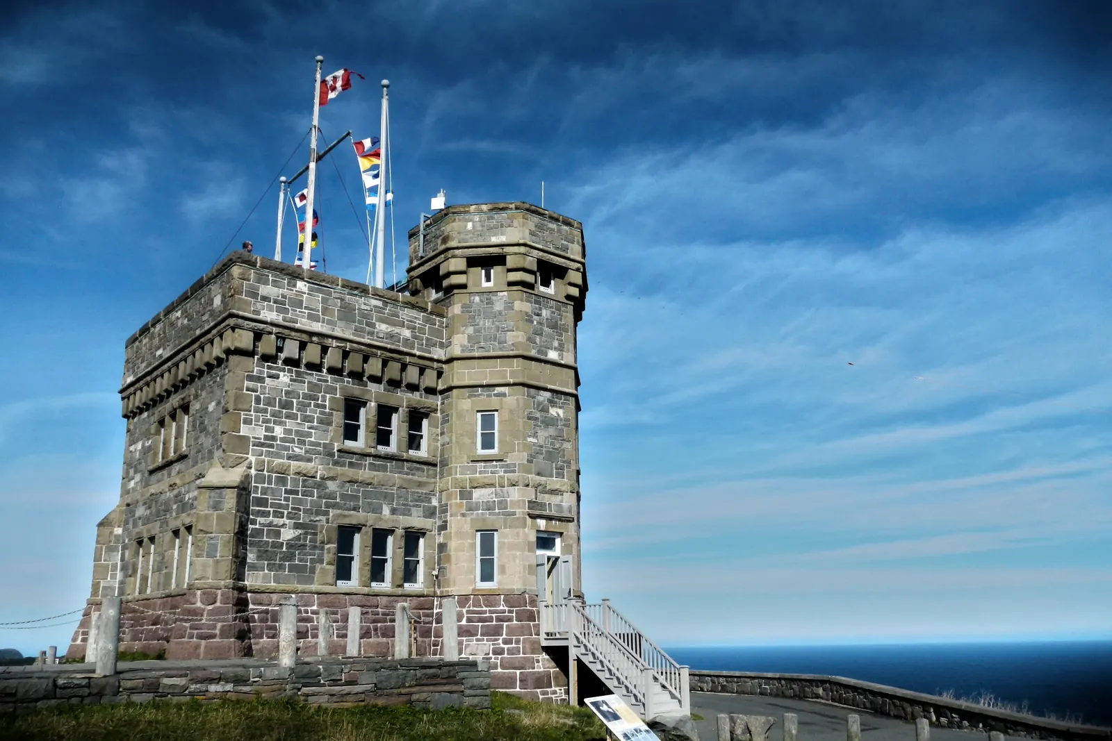 Cabot Tower on Signal Hill in St. John’s, Newfoundland, with flagpoles on the roof