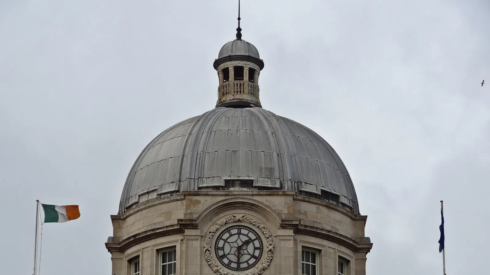 The Department of the Taoiseach in Dublin with the National Flag beside the dome
