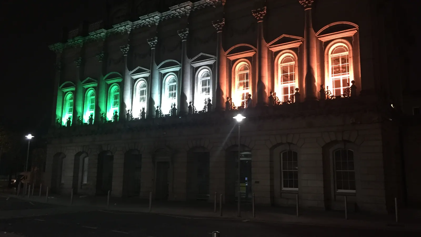 Heuston Station in Dublin lit in green, white and orange at night