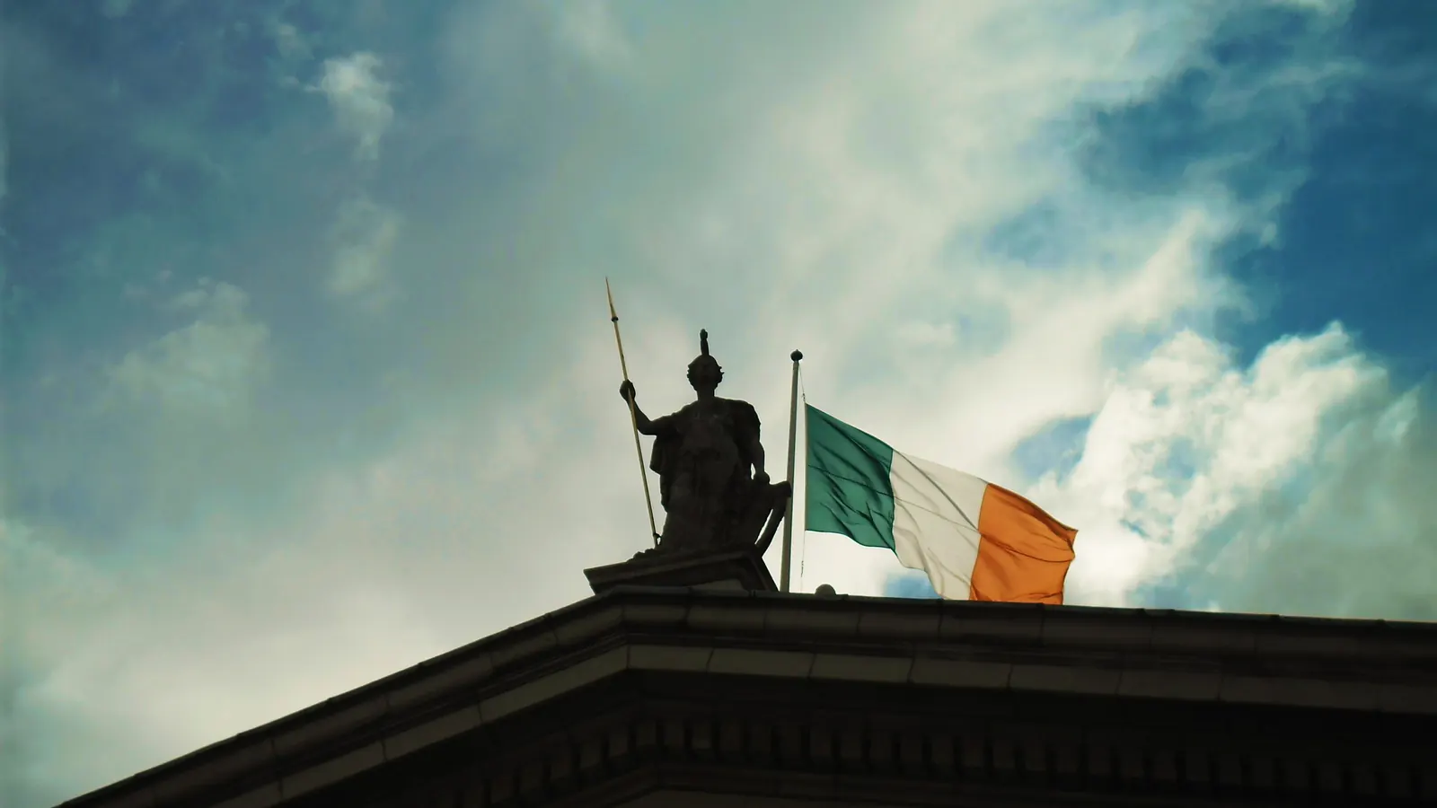 The Irish tricolour flying beside a statue in Dublin