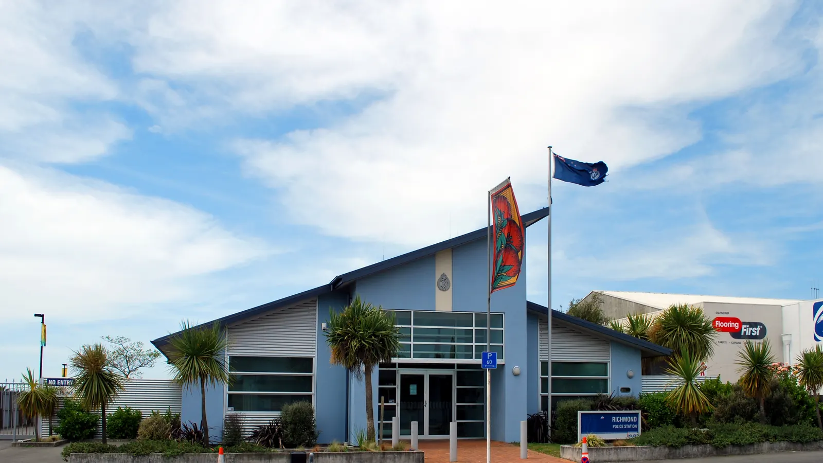 The police station in Richmond, Tasman, with flags on two flagpoles