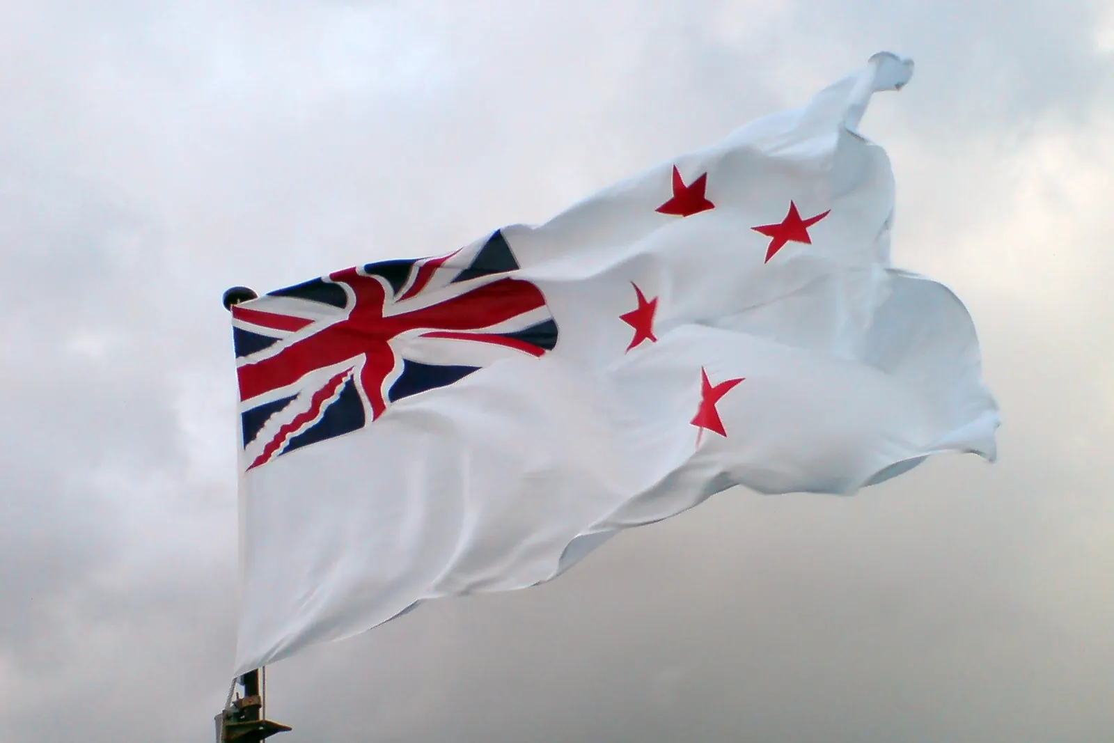 The New Zealand White Ensign flying on the frigate HMNZS Te Kaha