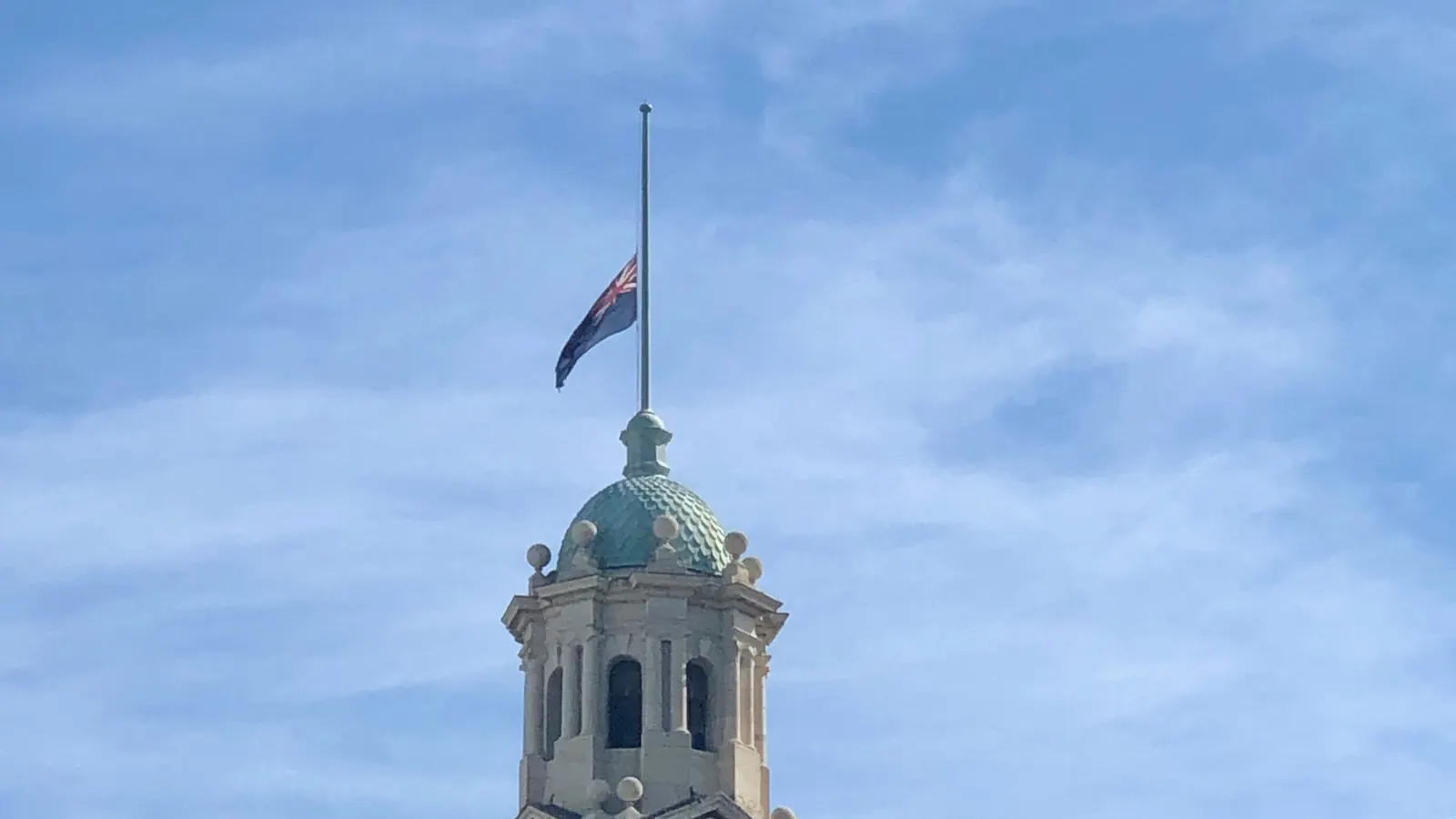 Auckland Town Hall with the New Zealand flag at half-mast in March 2019