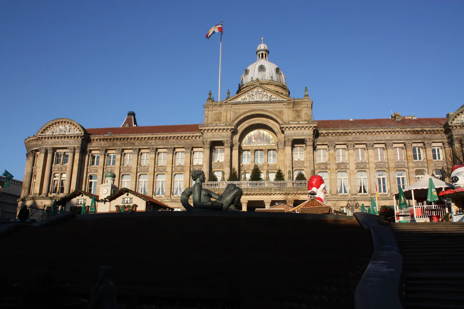 The Council House in Birmingham with a flag on the dome