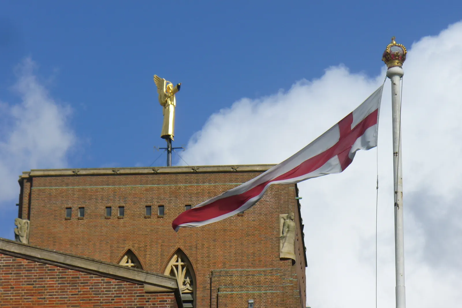 The St George’s Cross on a flagpole with a gilded finial in Guildford