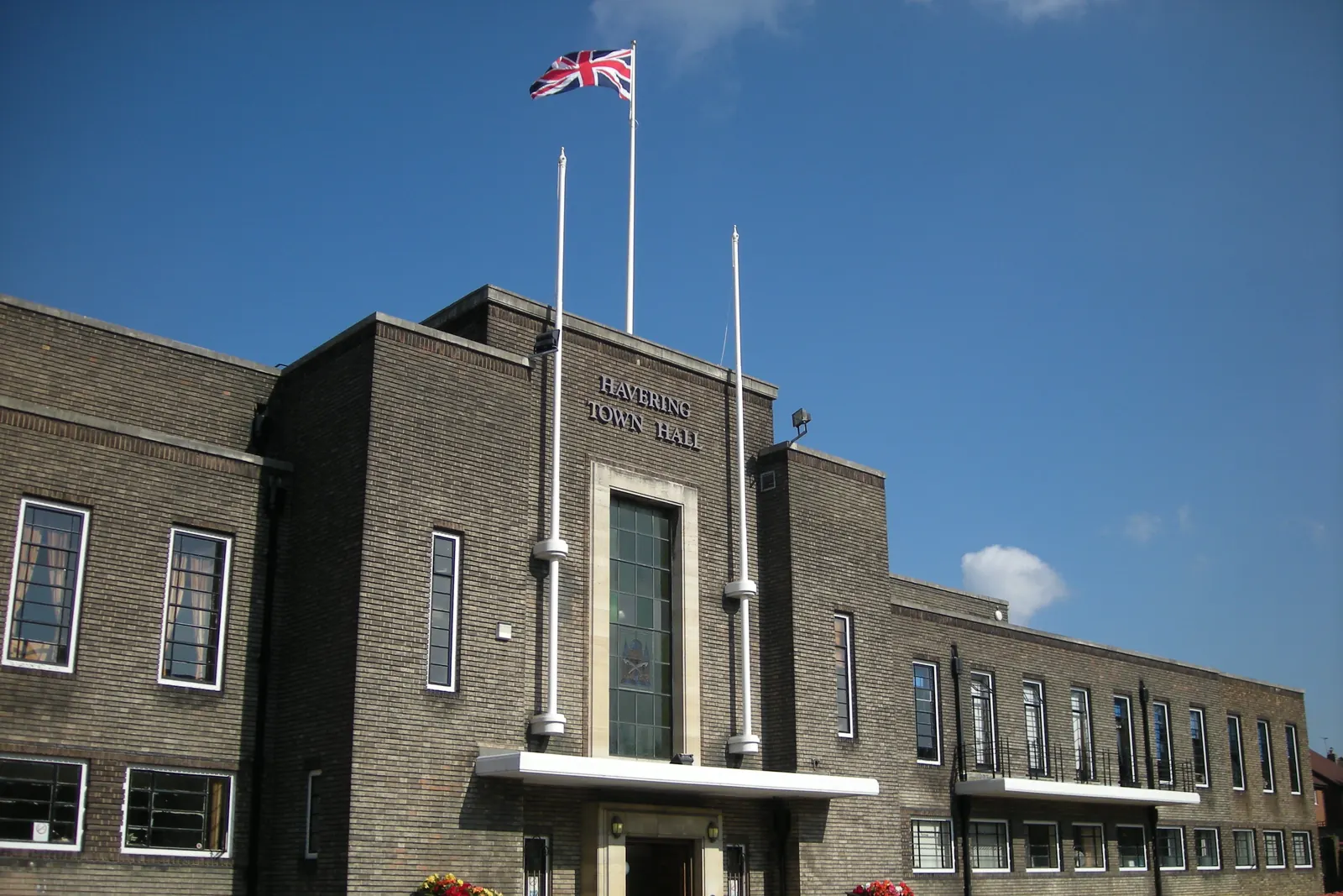 Havering Town Hall with flagpoles at the entrance
