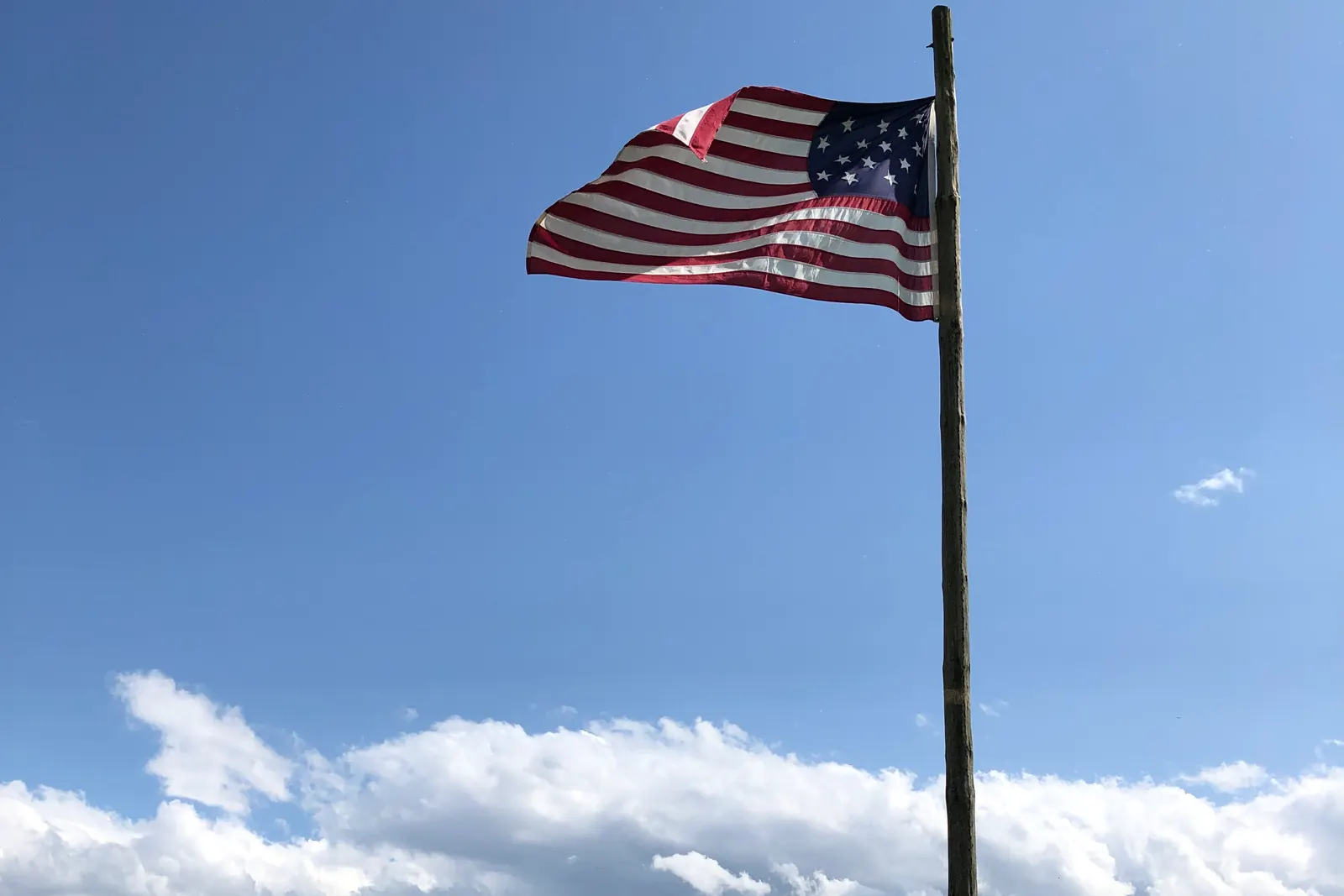 A wooden flagpole with the flag of the United States at Fort Meigs, Ohio