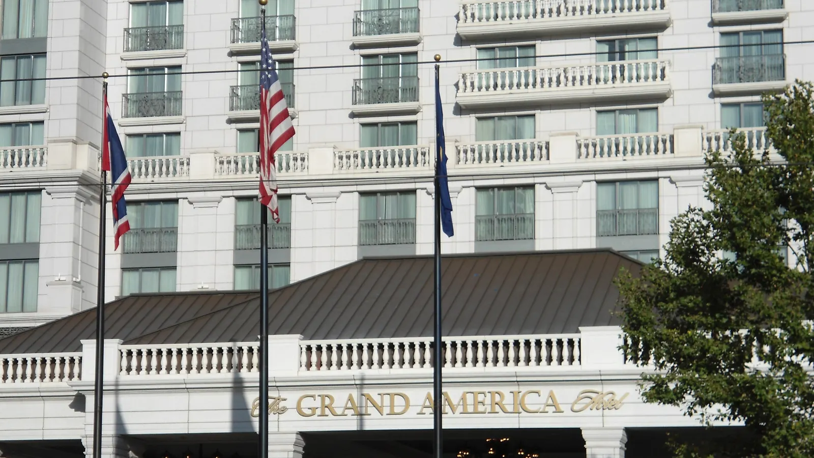 The Grand America Hotel in Salt Lake City with flags at the entrance