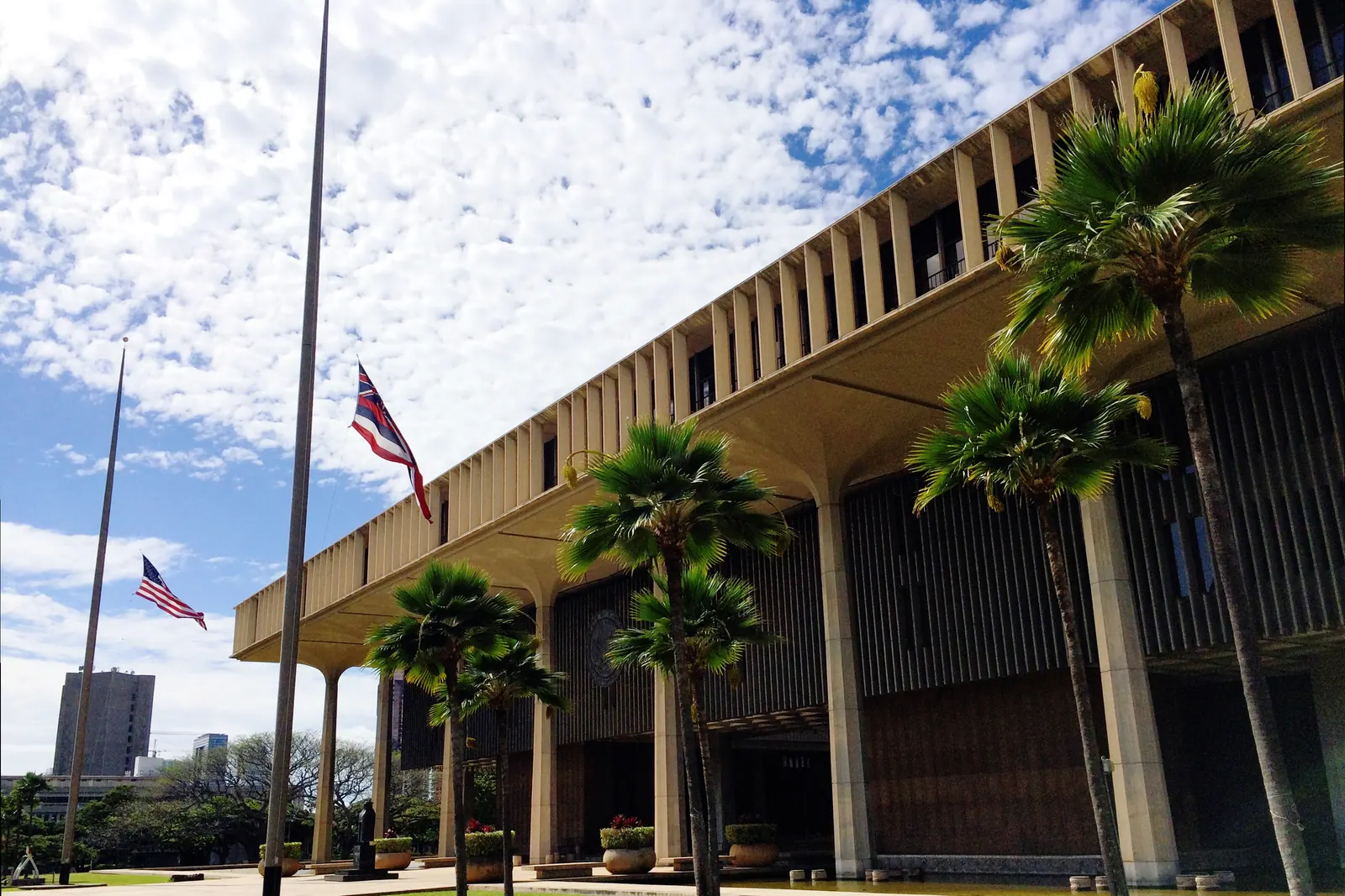 Flags at half-staff in front of the Hawaii State Capitol in Honolulu